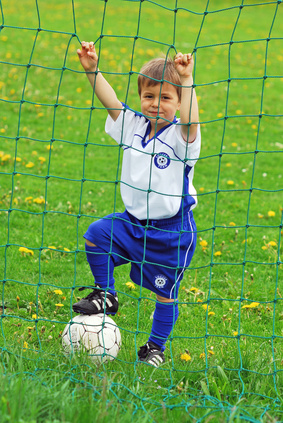 Junge im Fußballtor